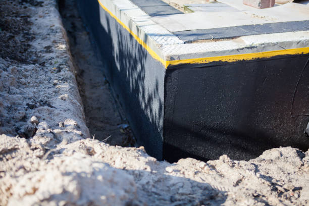 Professional Waterproofing technician working in Trimble, OH